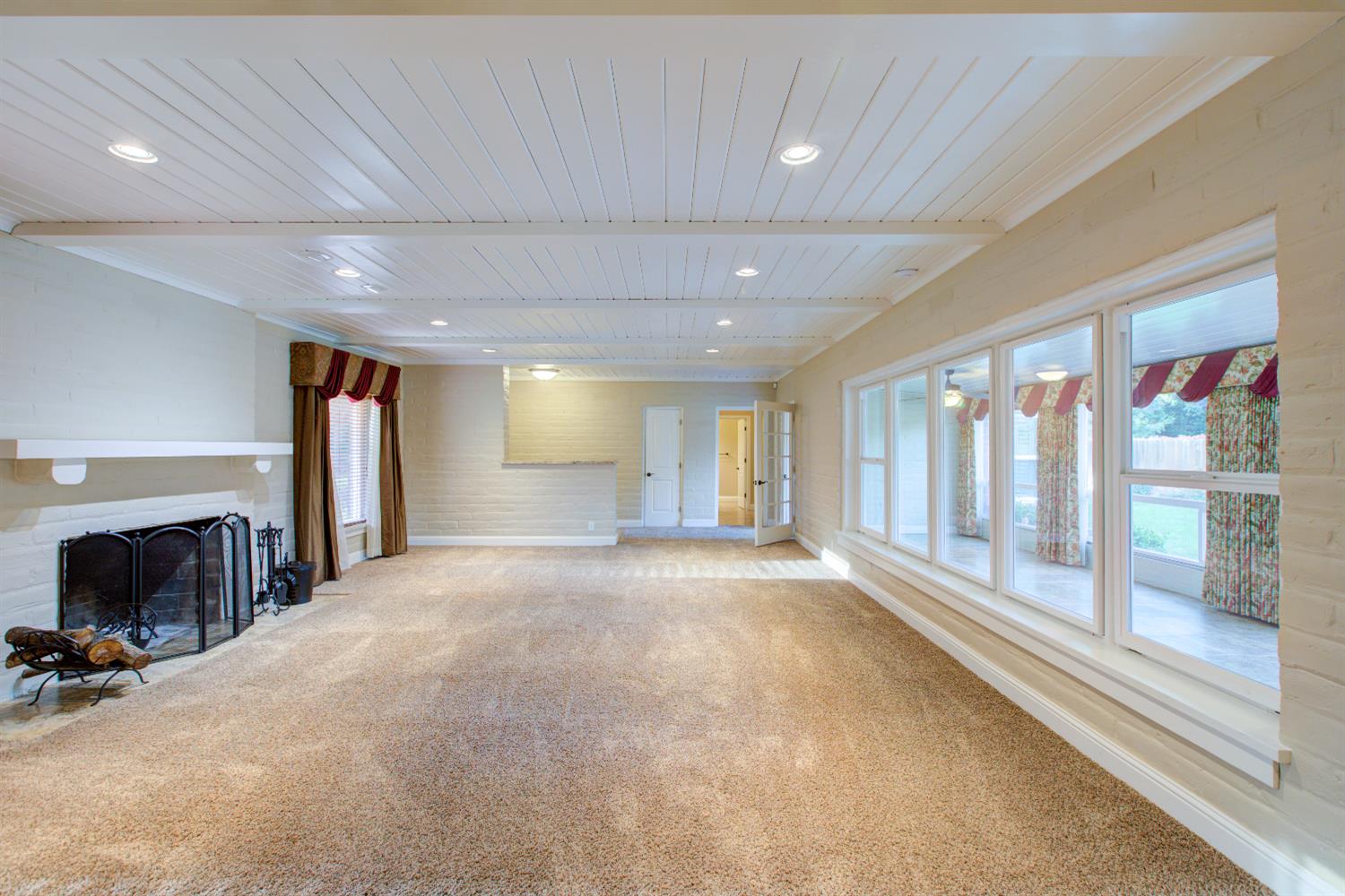 1739 First Street Atwater, CA 95301 - Photo 21 of 58 a view of an empty room with a fireplace