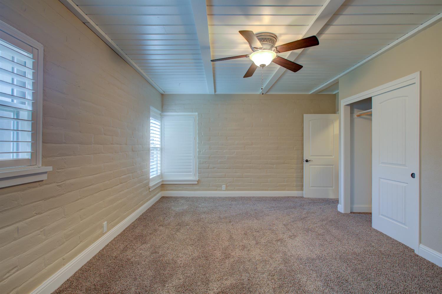 1739 First Street Atwater, CA 95301 - Photo 22 of 58 wooden floor in an empty room with a window