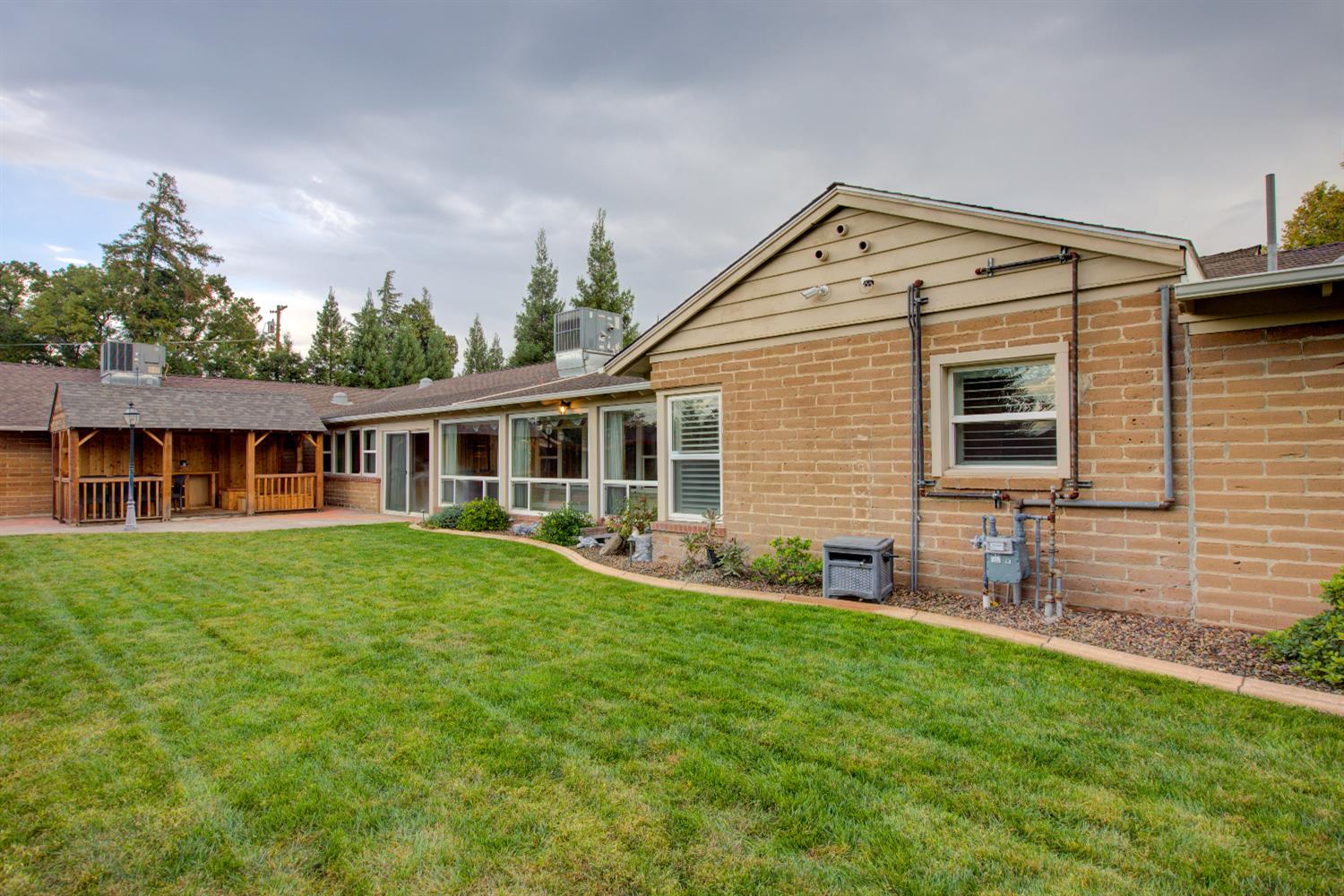 1739 First Street Atwater, CA 95301 - Photo 6 of 58 a front view of house with yard and green space