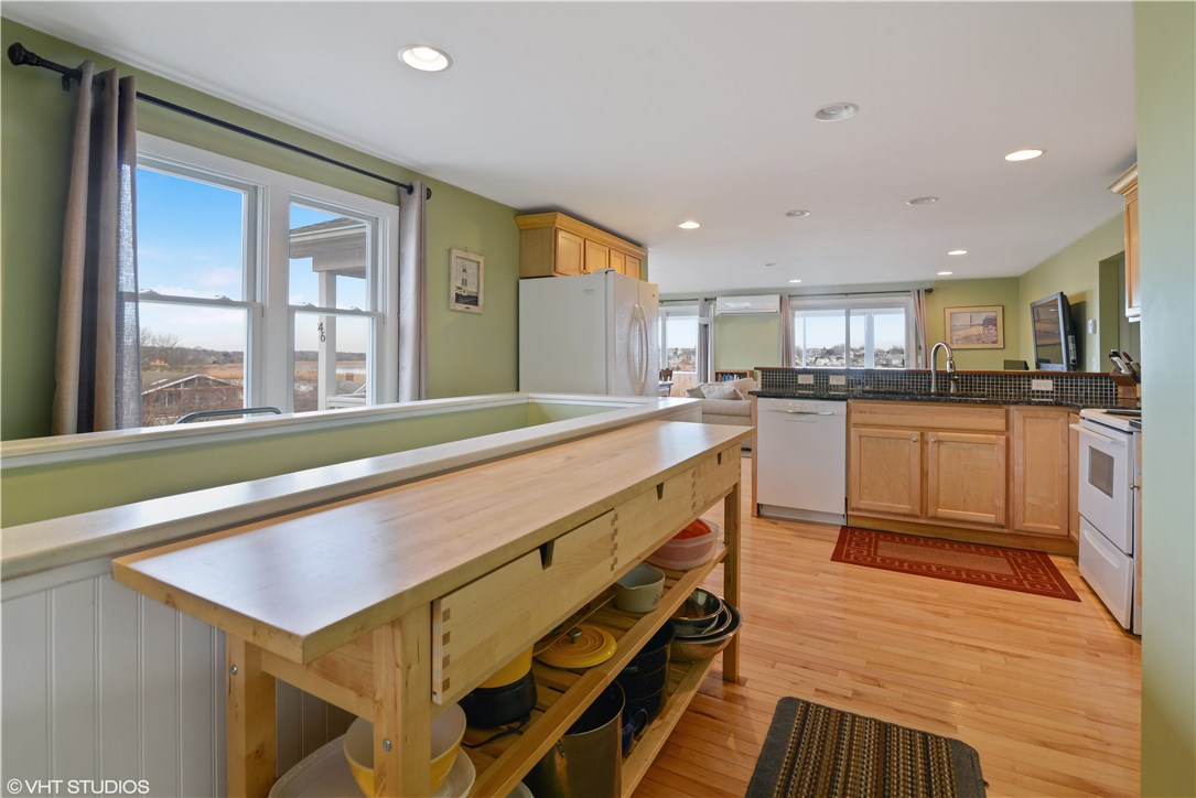 46 Conanicut Road Narragansett, RI 02882 - Photo 8 of 36 Entering from the patio, the extra-wide hallway provides plenty of room for parking groceries and storage.