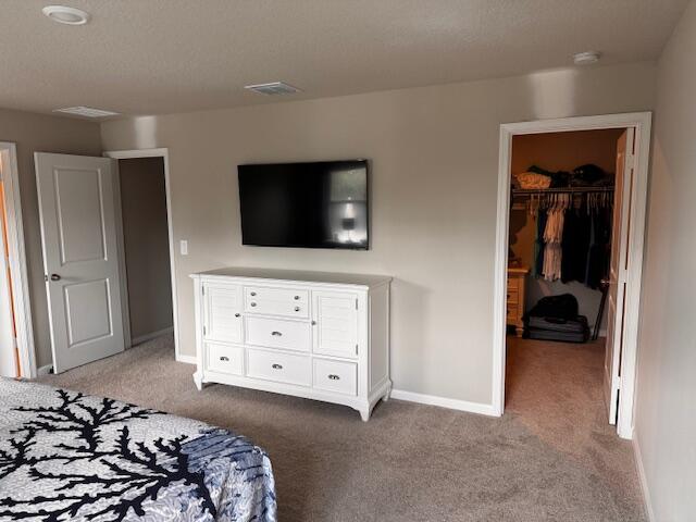 5786 Southeast Edgewater Circle Stuart, FL 34997 - Photo 8 of 15 a bedroom with a bed and a flat tv screen in it