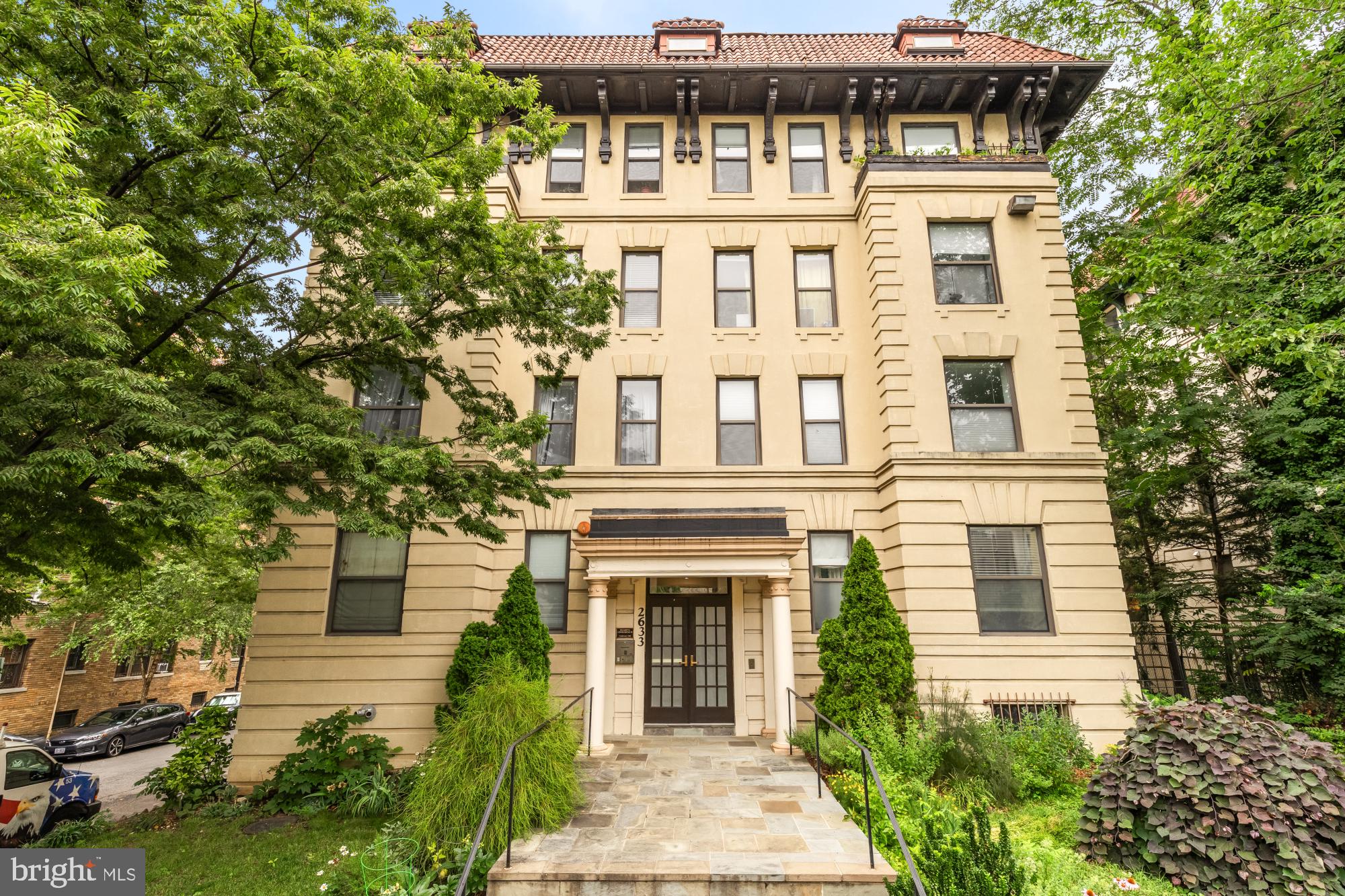 front view of house with a small yard