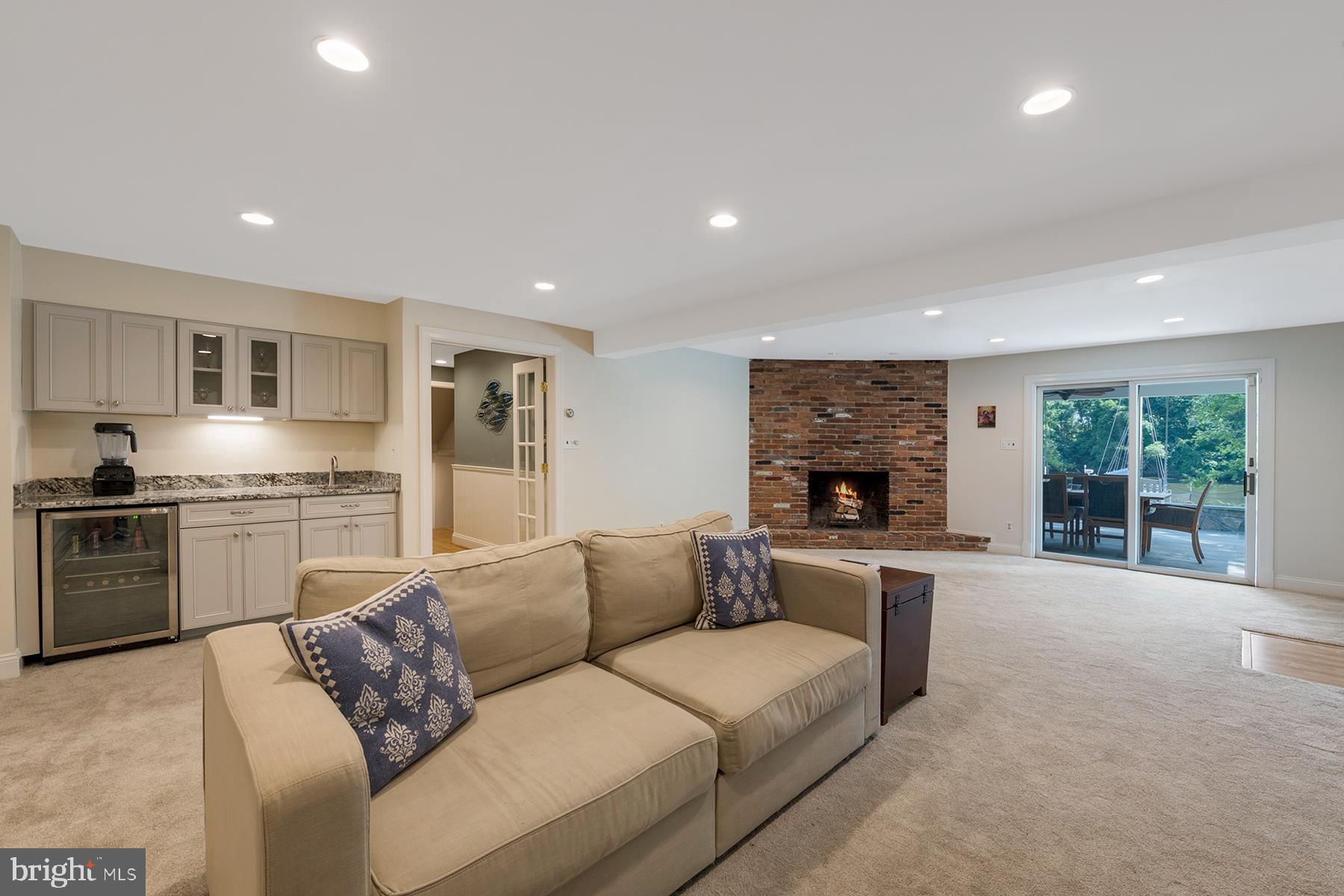 252 Providence Road Annapolis, MD 21409 - Photo 43 of 63 Game room has wet bar & fireplace