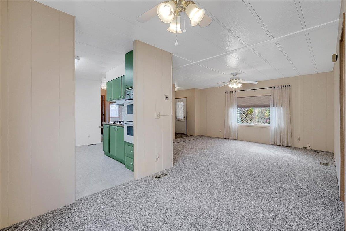 1155 Pease Road, Unit 511 Yuba City, CA 95991 - Photo 17 of 35 en empty room with windows and fireplace