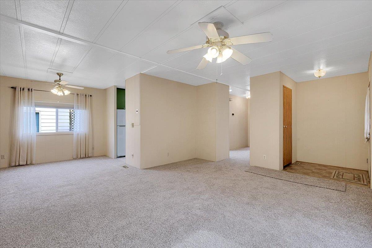 1155 Pease Road, Unit 511 Yuba City, CA 95991 - Photo 20 of 35 a view of an empty room with a chandelier fan