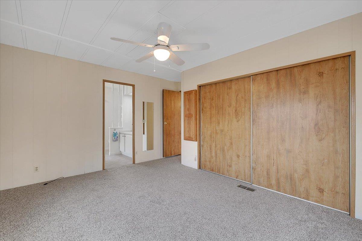 1155 Pease Road, Unit 511 Yuba City, CA 95991 - Photo 24 of 35 a view of an empty room with a chandelier fan