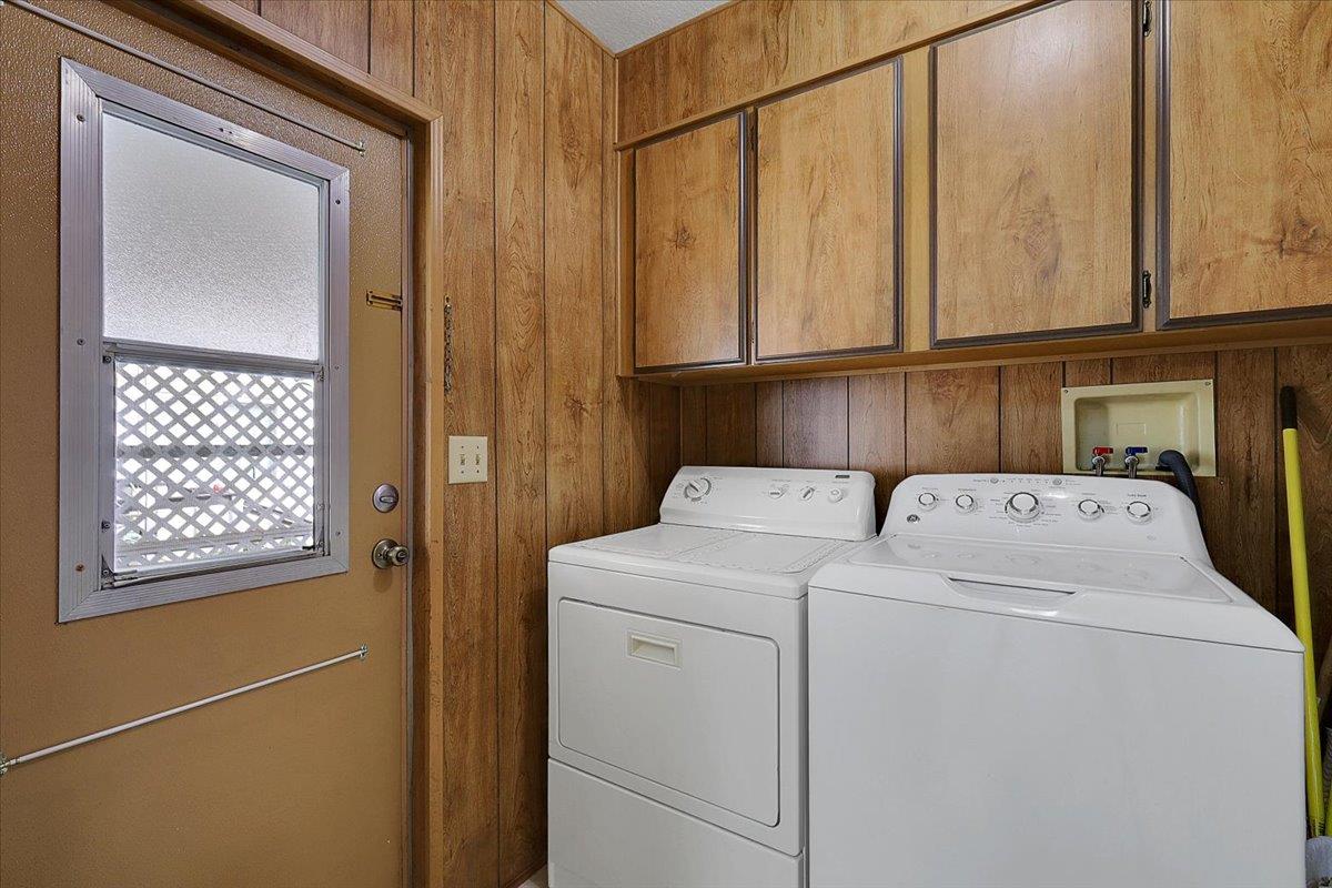 1155 Pease Road, Unit 511 Yuba City, CA 95991 - Photo 28 of 35 a view of storage and utility room with washer and dryer