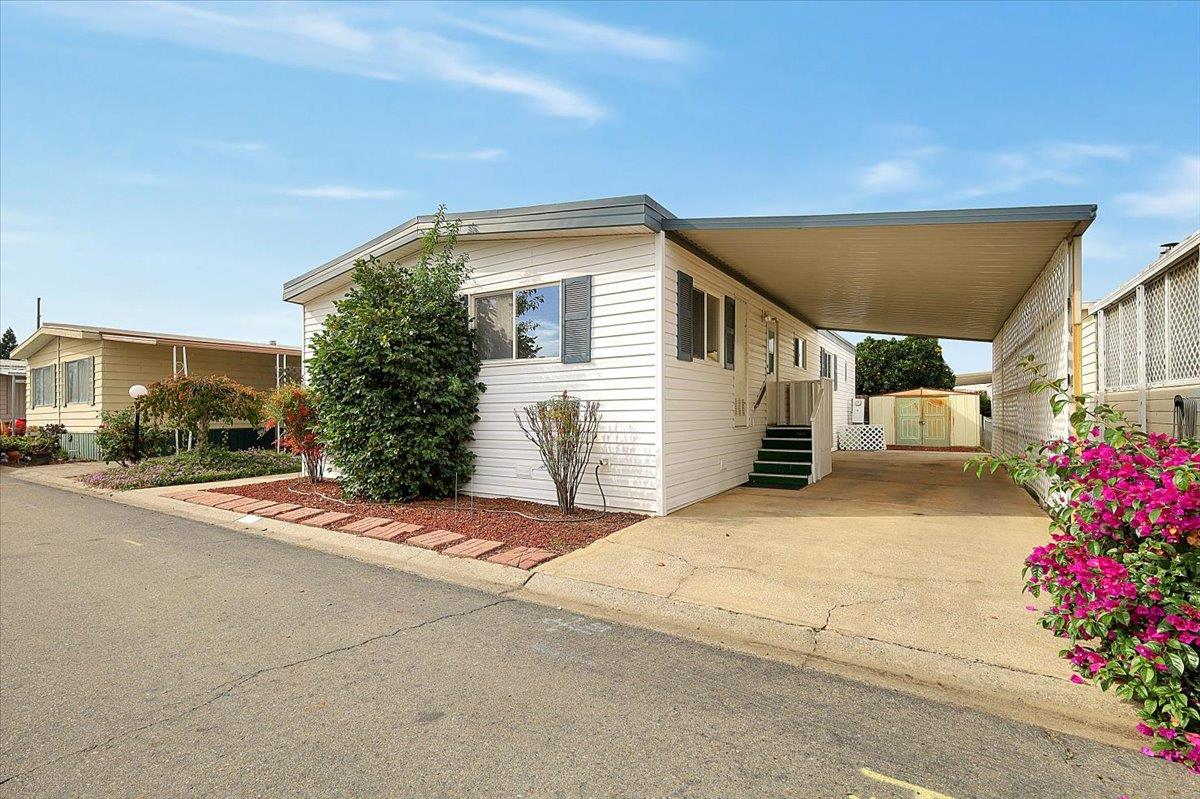 1155 Pease Road, Unit 511 Yuba City, CA 95991 - Photo 3 of 35 a house view with a outdoor space