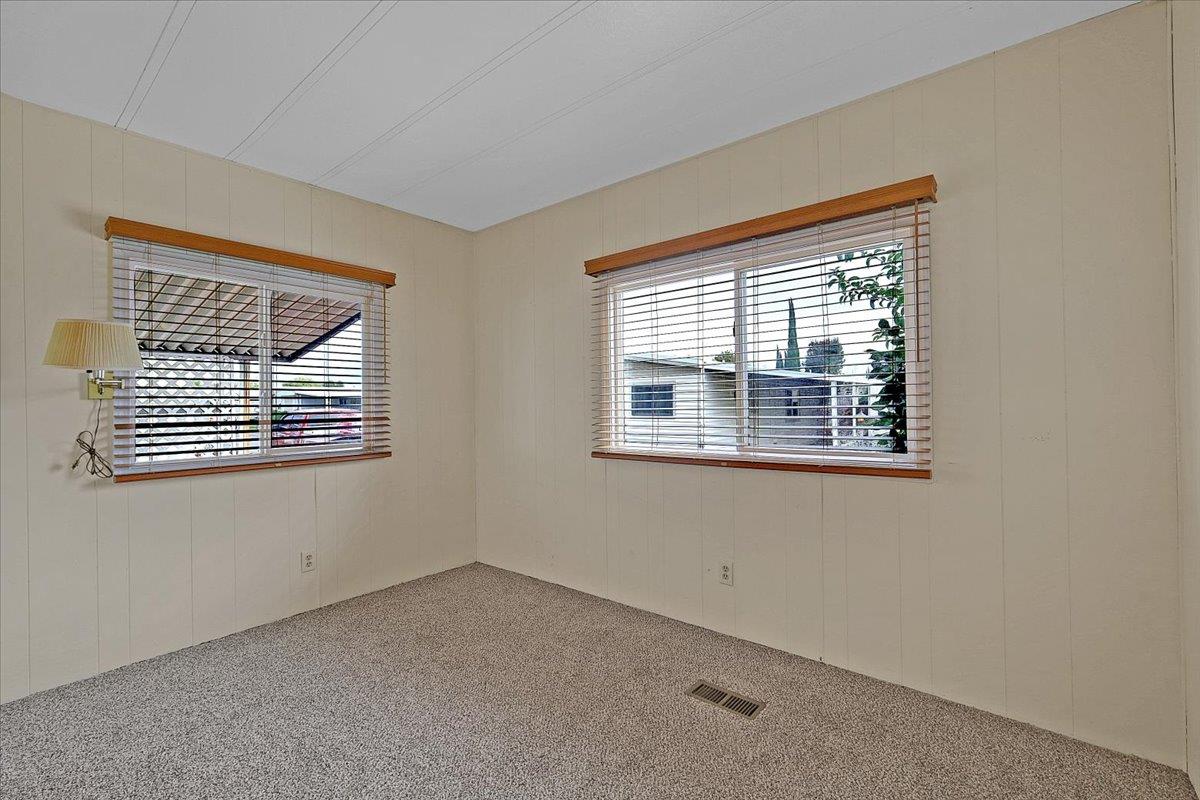1155 Pease Road, Unit 511 Yuba City, CA 95991 - Photo 4 of 35 an empty room with windows