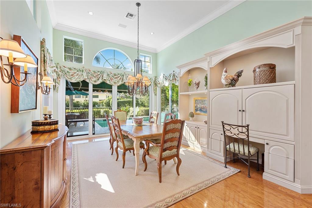 8063 Vizcaya Way Naples, FL 34108 - Photo 9 of 28 a view of a dining room with furniture window and outside view