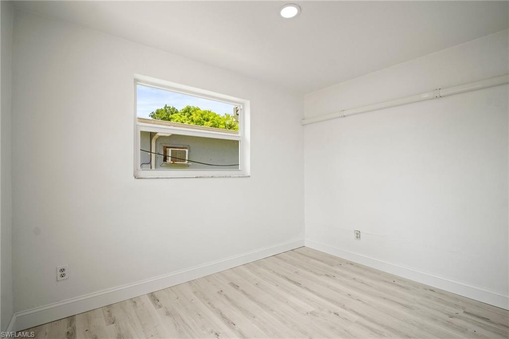 2316 Bayside Street Naples, FL 34112 - Photo 9 of 24 an empty room with window