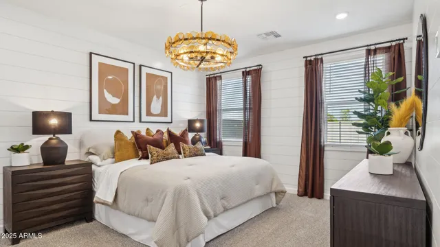 a bathroom with a sink a mirror and a shower