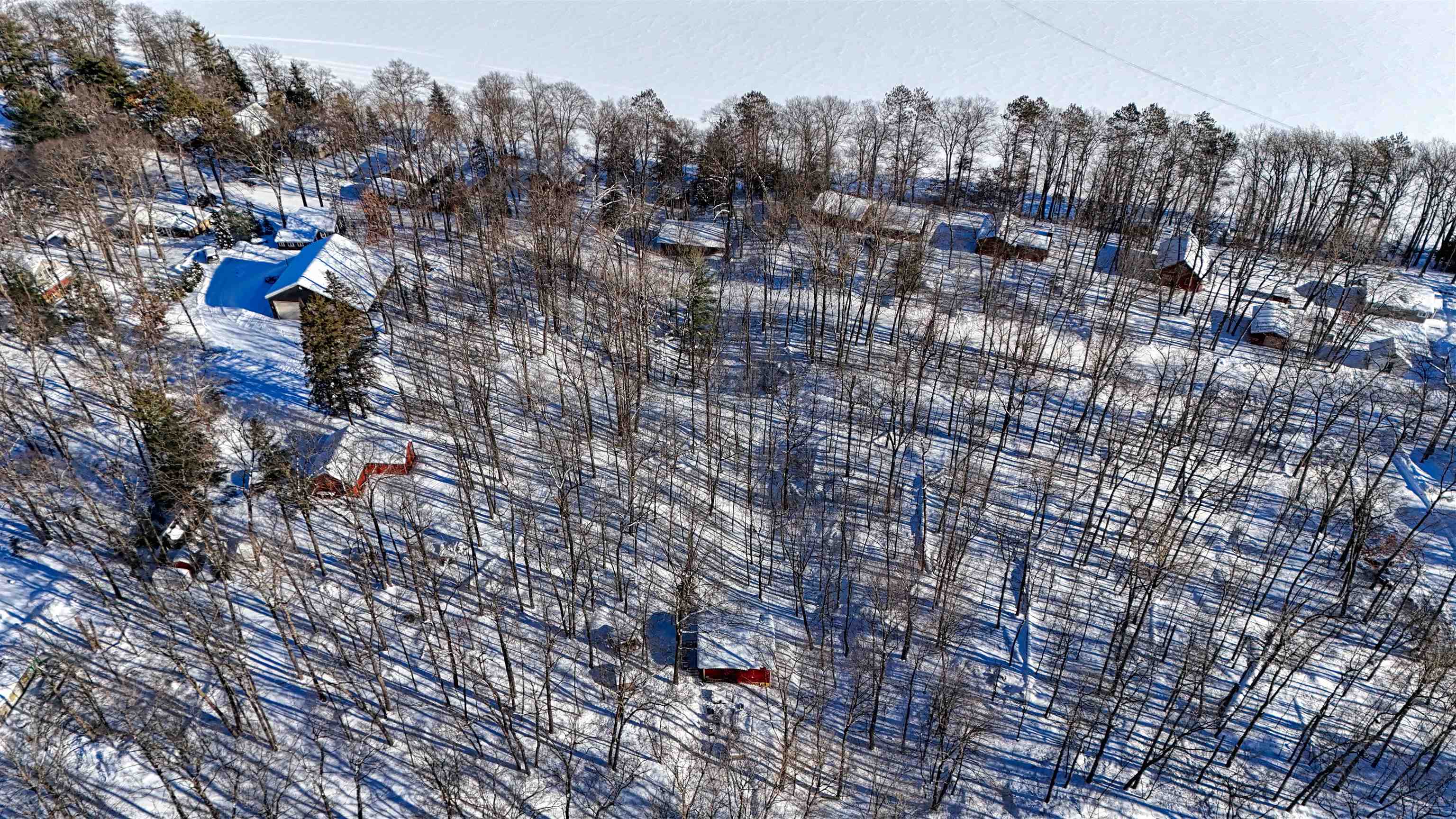 29-30 Summit Avenue Hayward, WI 54843 - Photo 3 of 12 Drone / aerial view of a tree filled landscape