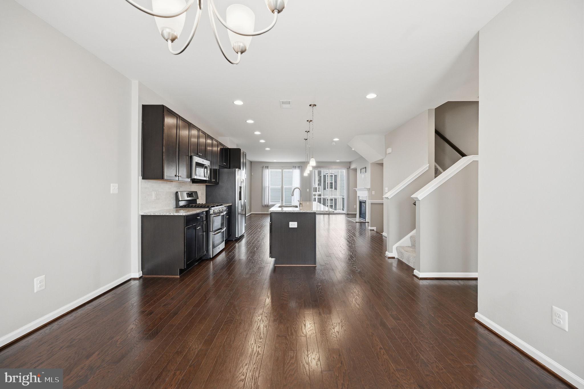 650 Aspen Road, Unit 108 Stafford, VA 22554 - Photo 5 of 26 Modern open-concept living space.
