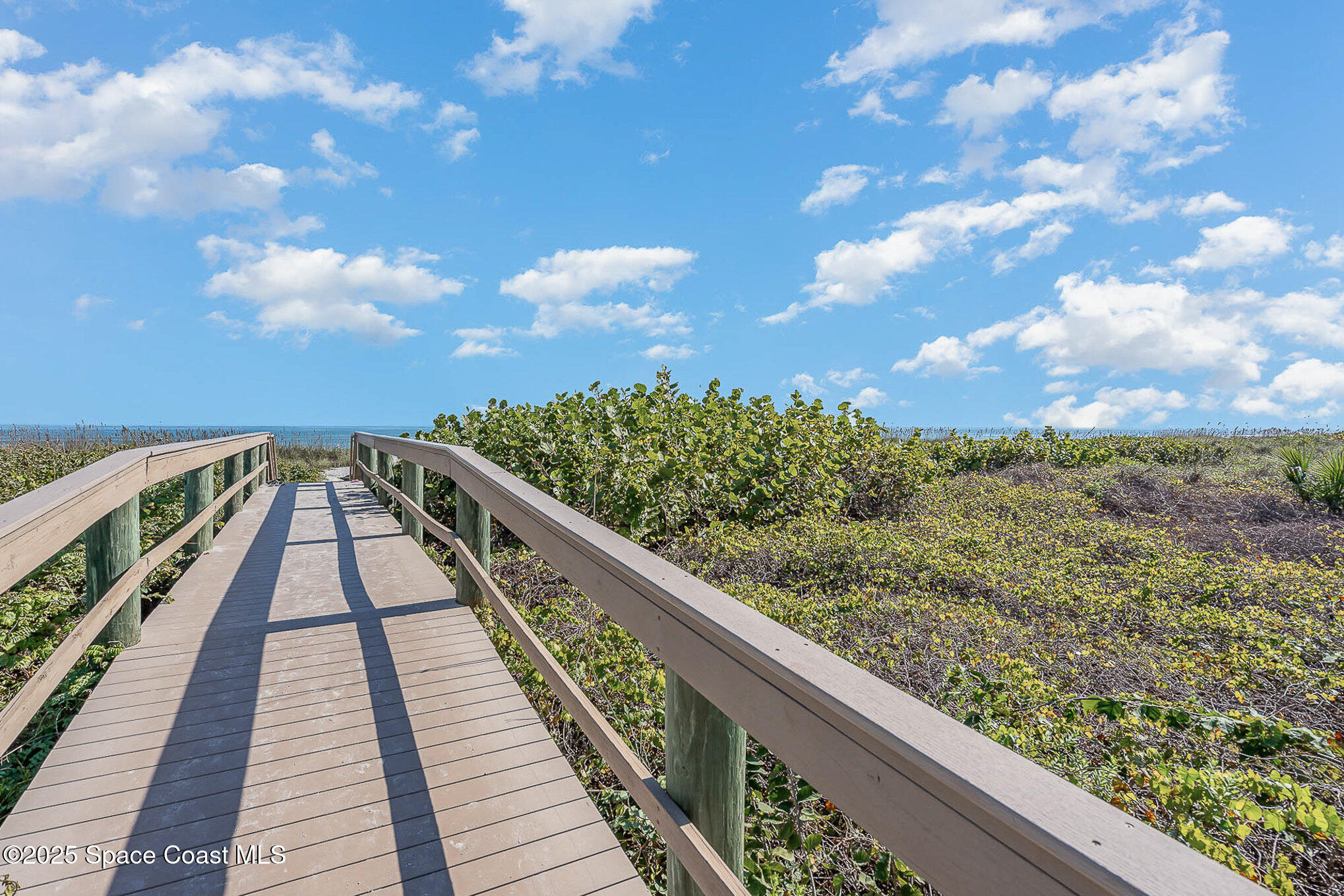 3150 North Atlantic Avenue, Unit 11550 Cocoa Beach, FL 32931 - Photo 22 of 30 a view of a city from a balcony