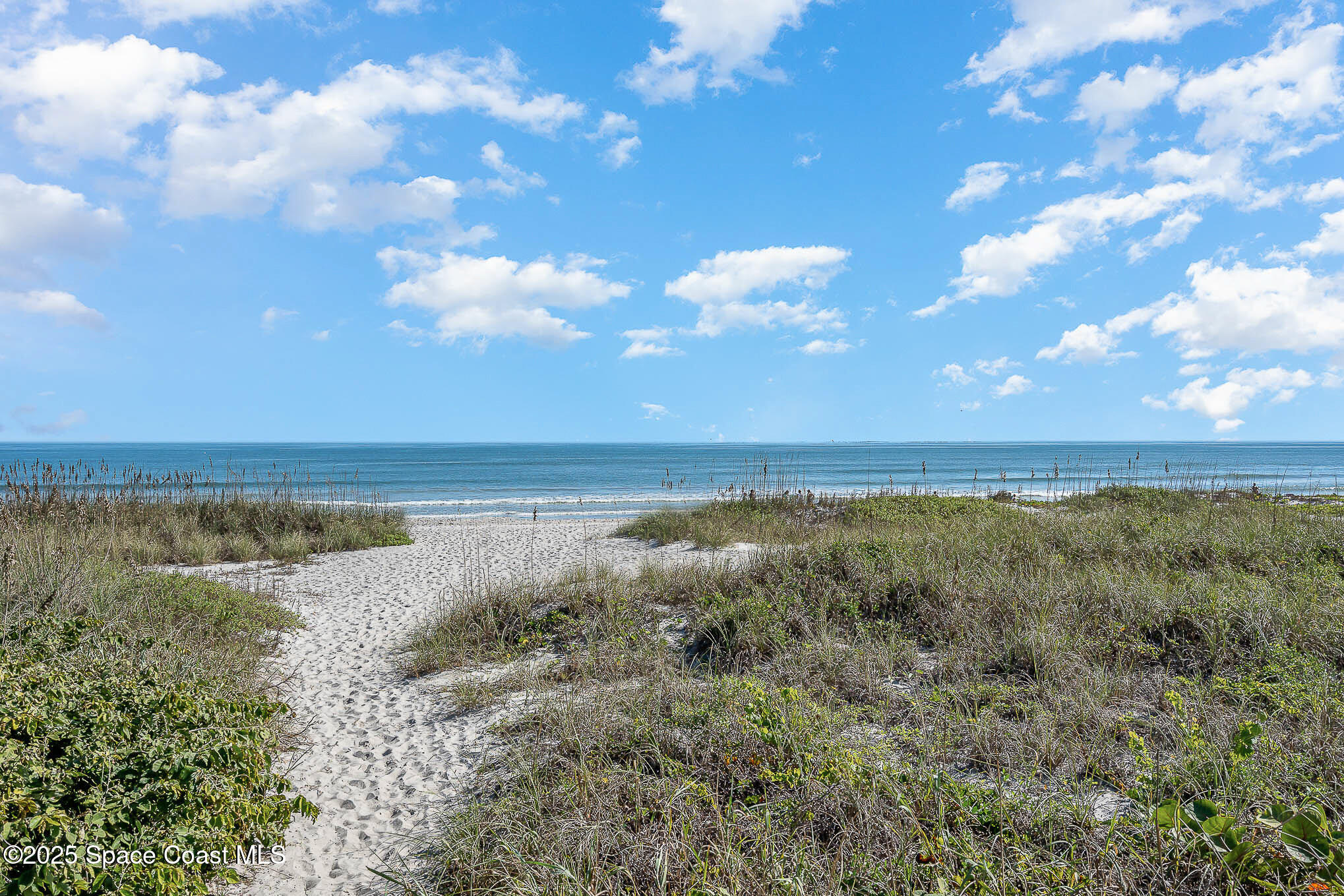3150 North Atlantic Avenue, Unit 11550 Cocoa Beach, FL 32931 - Photo 23 of 30 a view of an ocean and beach