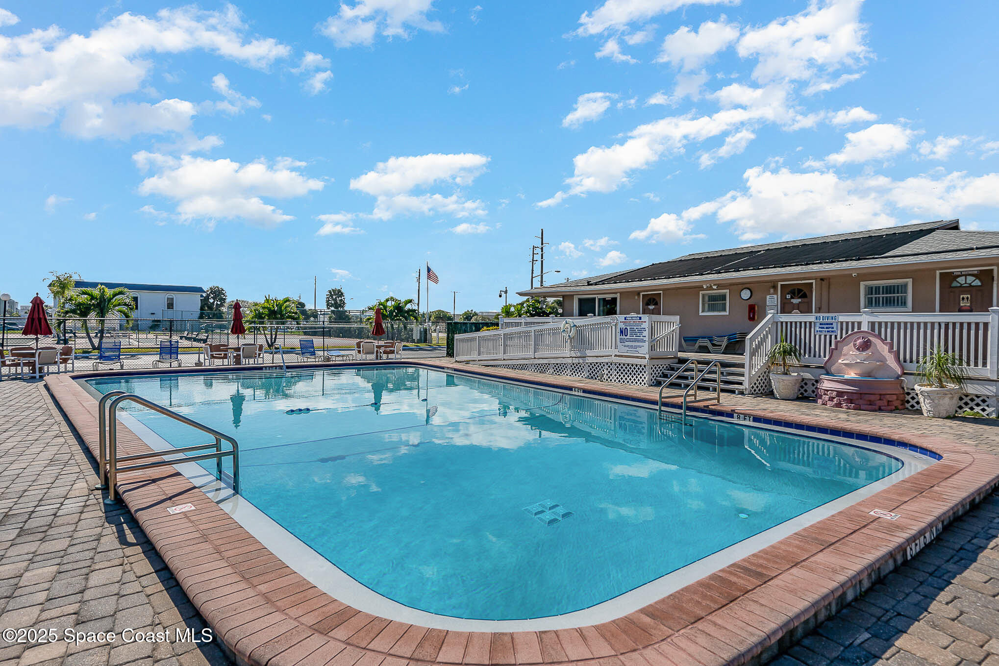 3150 North Atlantic Avenue, Unit 11550 Cocoa Beach, FL 32931 - Photo 24 of 30 a view of swimming pool with seating space