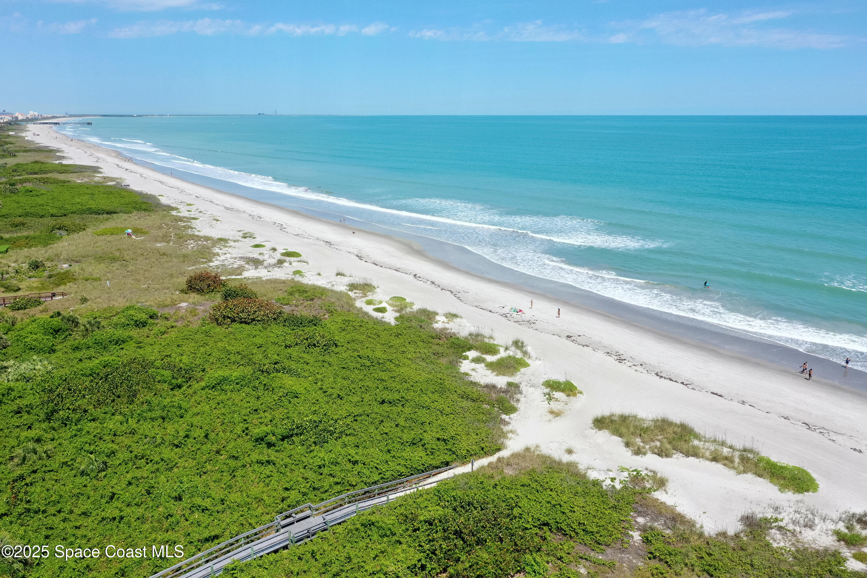 3150 North Atlantic Avenue, Unit 11550 Cocoa Beach, FL 32931 - Photo 27 of 30 a view of a beach with an ocean beach