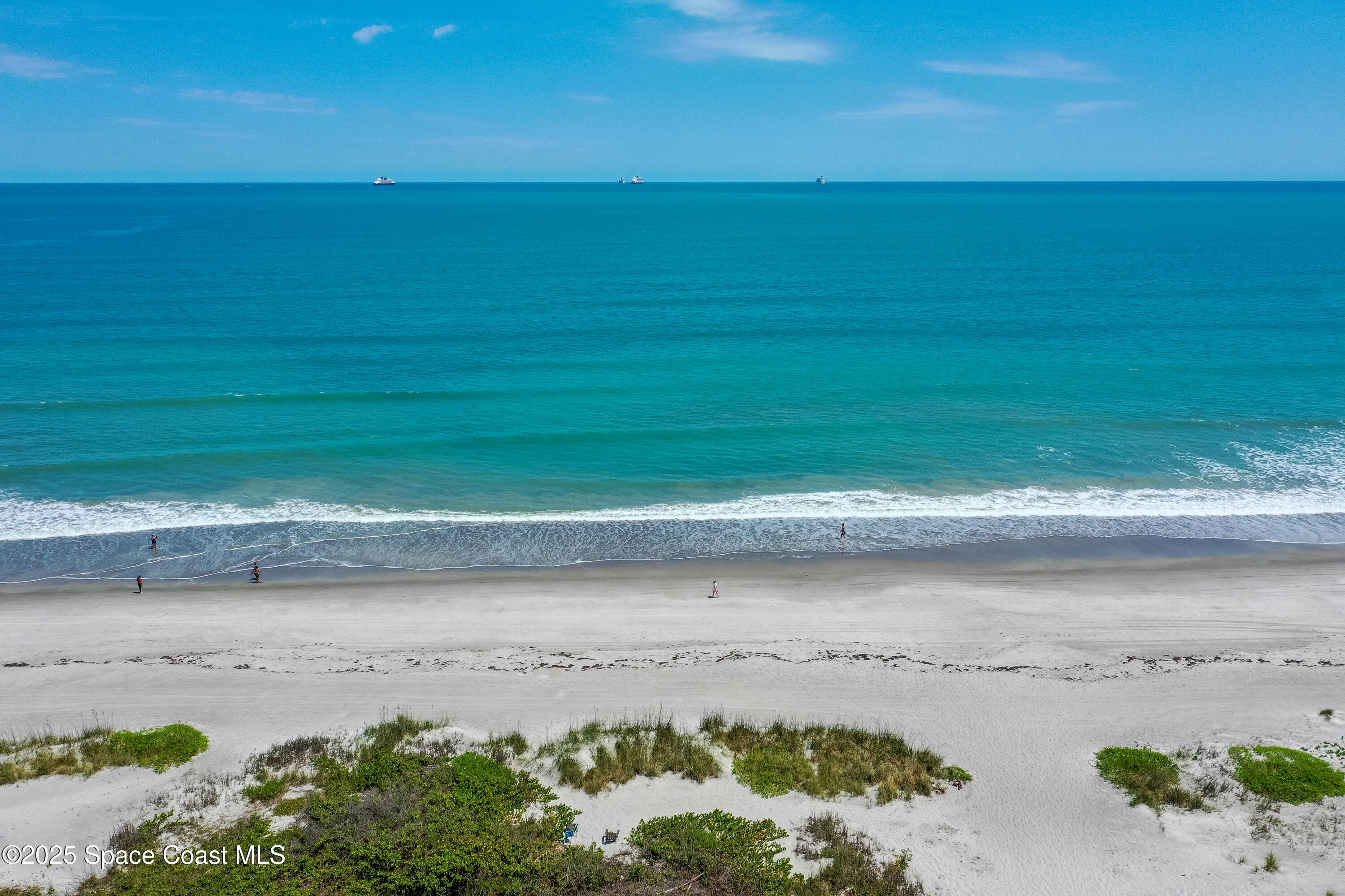 3150 North Atlantic Avenue, Unit 11550 Cocoa Beach, FL 32931 - Photo 28 of 30 a view of a beach