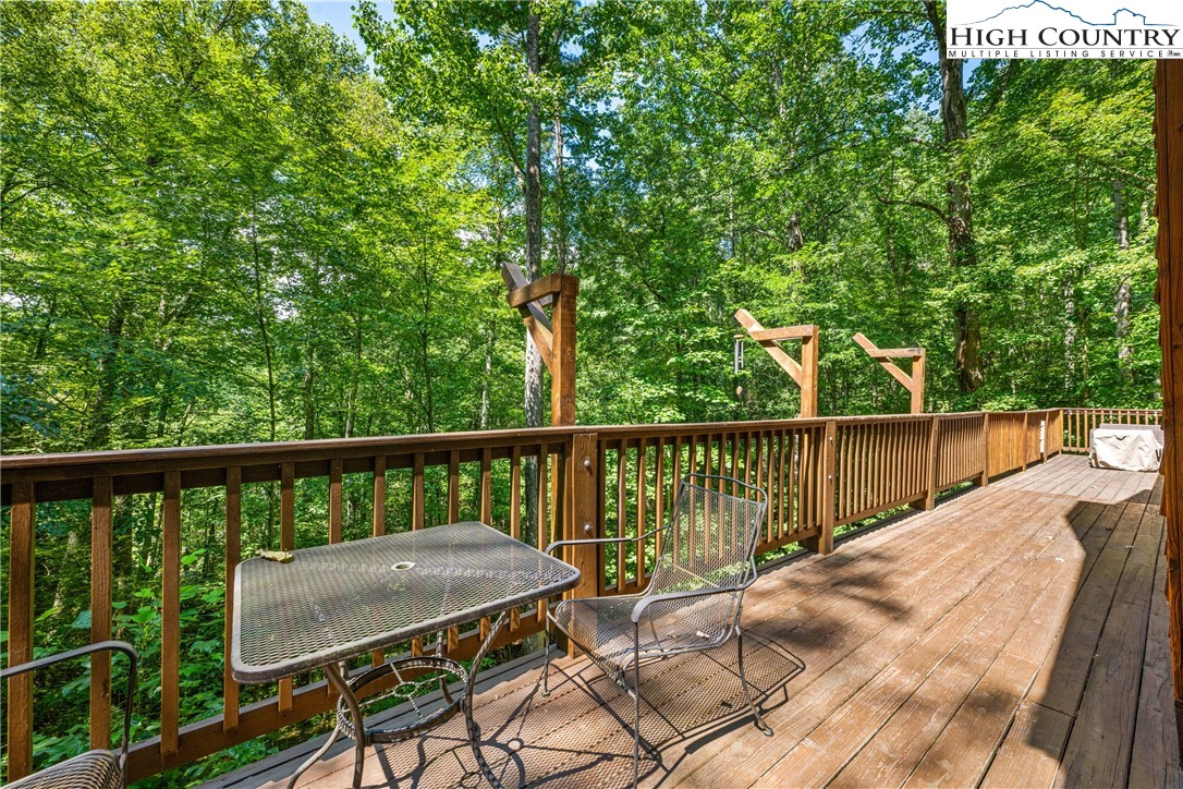 375 Winterberry Trail Boone, NC 28607 - Photo 29 of 36 a view of a balcony with wooden floor