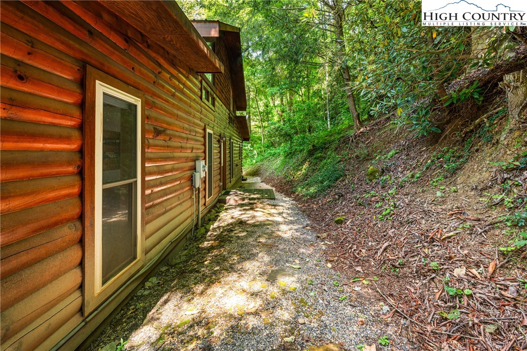 375 Winterberry Trail Boone, NC 28607 - Photo 33 of 36 a view of a house with a yard