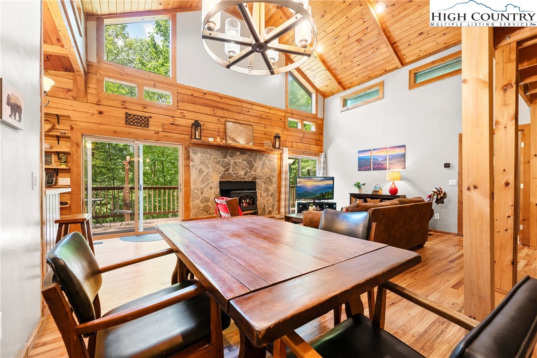 375 Winterberry Trail Boone, NC 28607 - Photo 8 of 36 a view of a patio with table and chairs