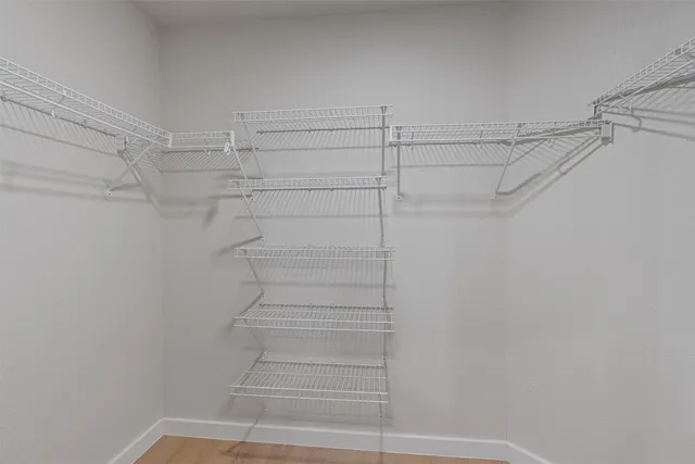 a view of a room with racks on the wall