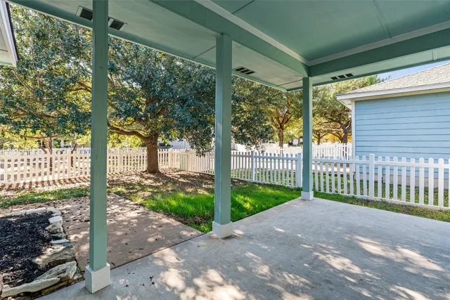 a view of a porch with a yard