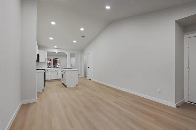 a view of kitchen with wooden floor