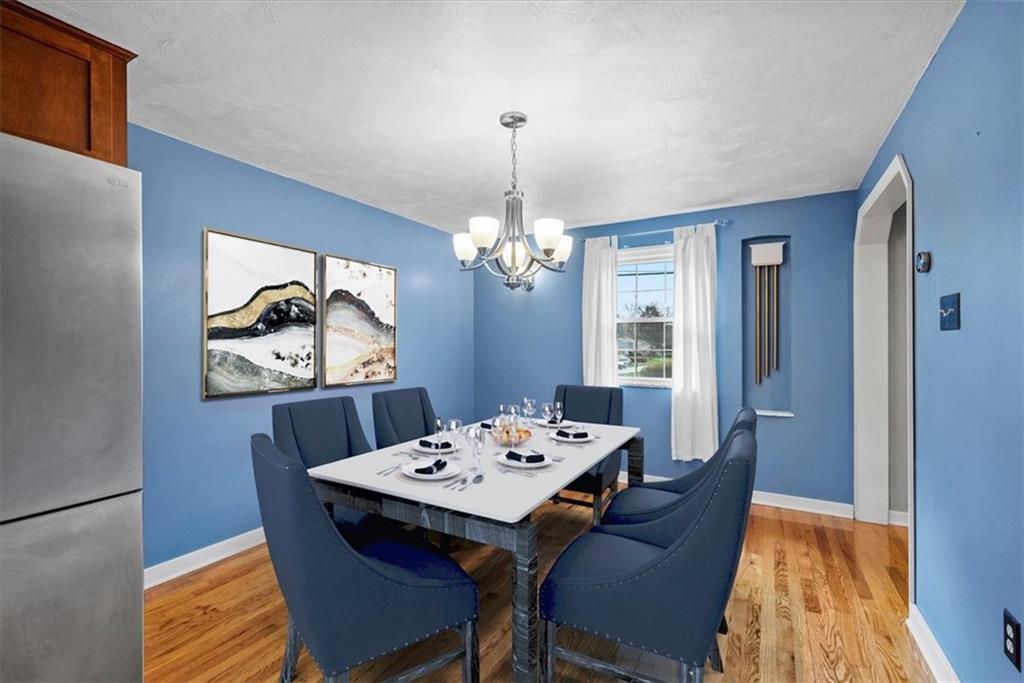 200 Hartle Road Glenshaw, PA 15116 - Photo 7 of 24 a view of a dining room with furniture window and wooden floor
