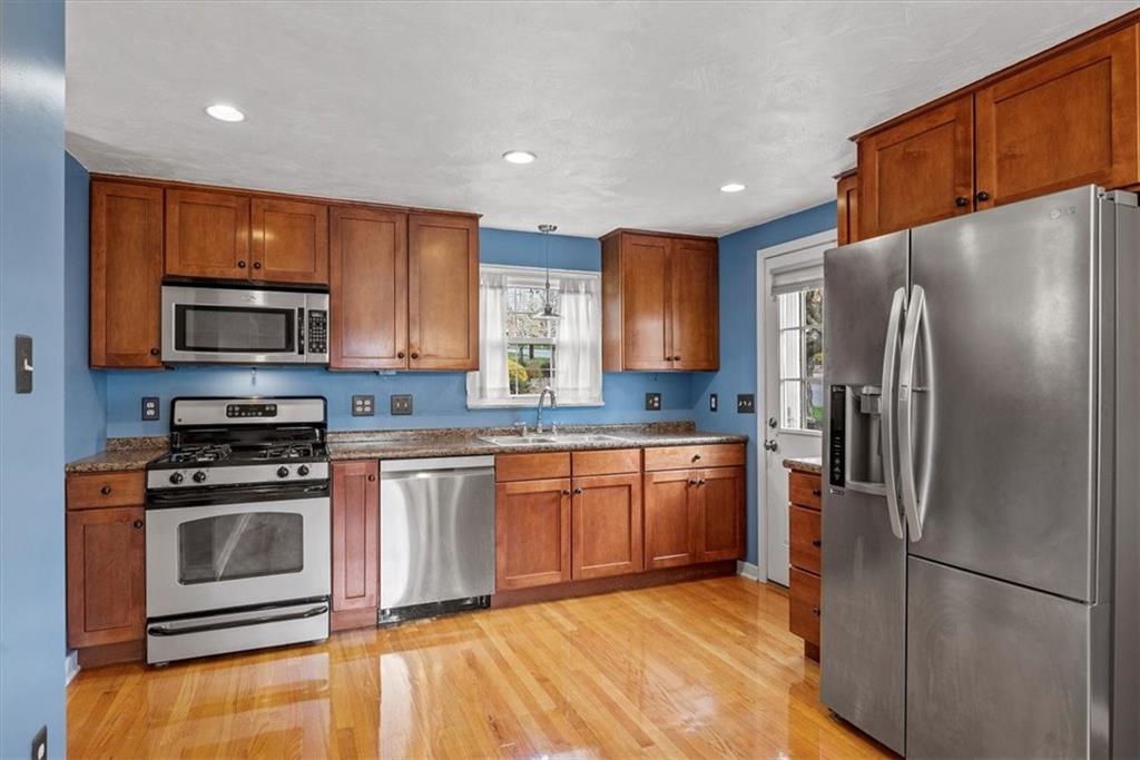 200 Hartle Road Glenshaw, PA 15116 - Photo 9 of 24 a kitchen with stainless steel appliances granite countertop a refrigerator stove top oven and sink