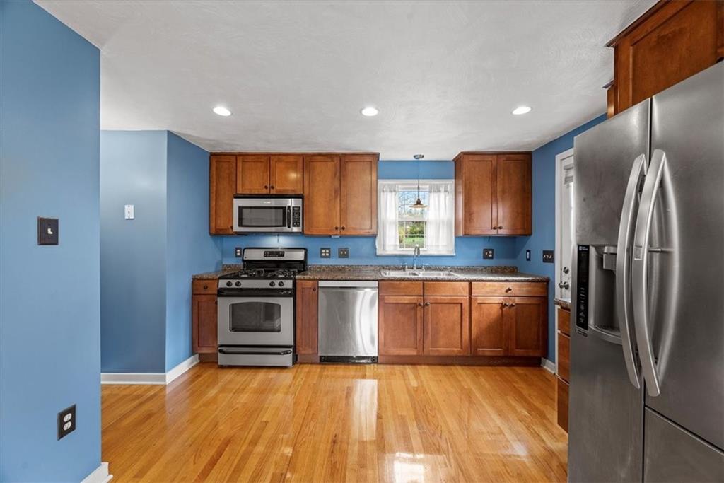 200 Hartle Road Glenshaw, PA 15116 - Photo 10 of 24 a kitchen with stainless steel appliances granite countertop a refrigerator sink and stove