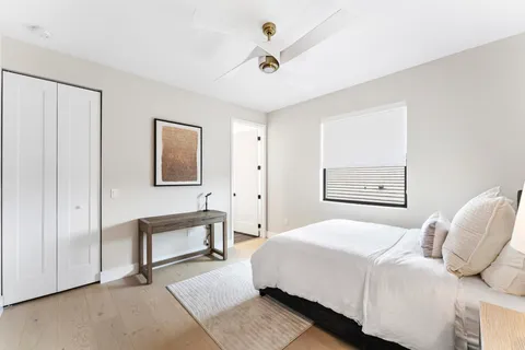 a swimming pool with outdoor seating yard and slide