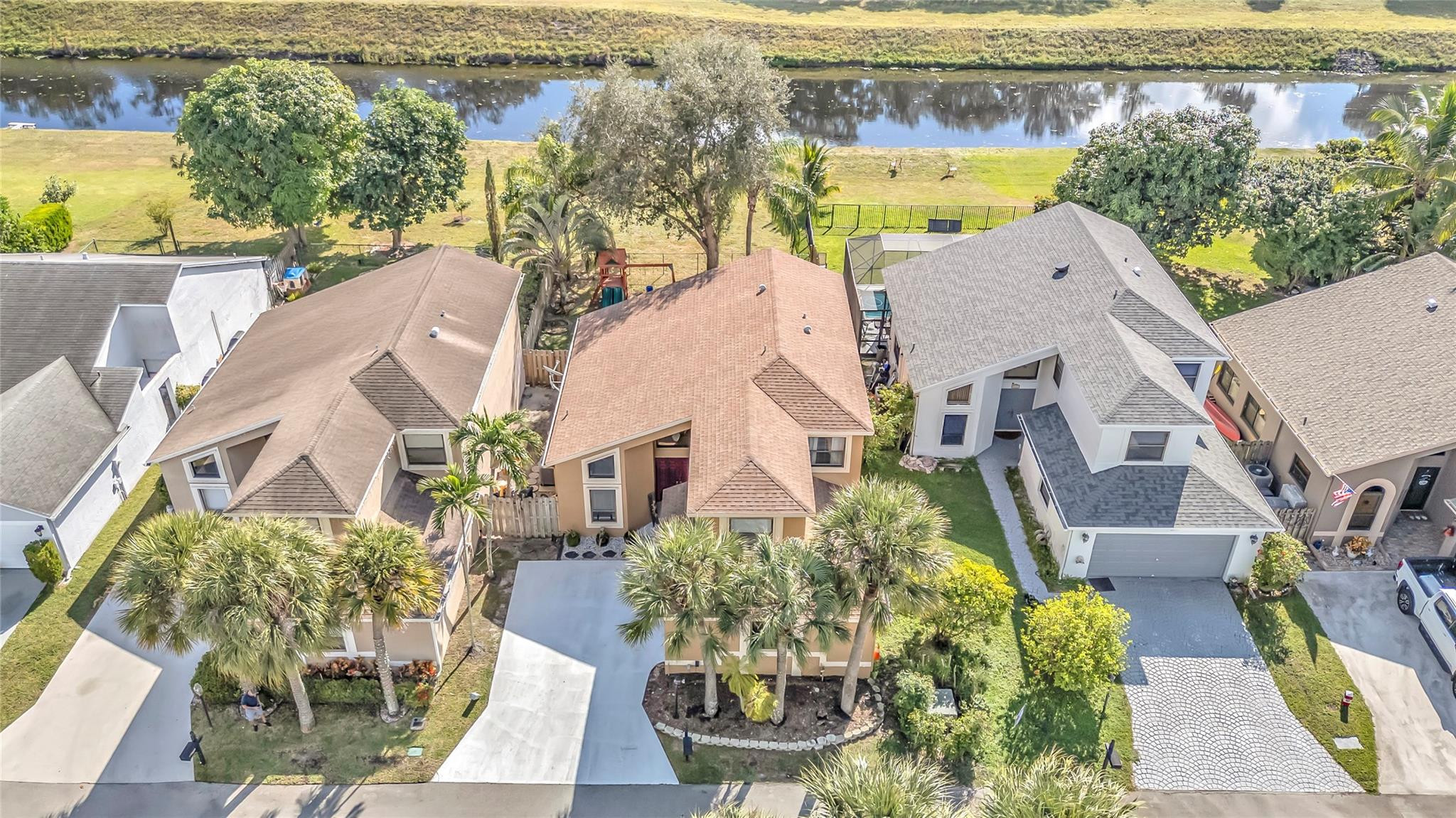 8610 Kimble Way Boca Raton, FL 33433 - Photo 20 of 26 a view of a swimming pool with a patio