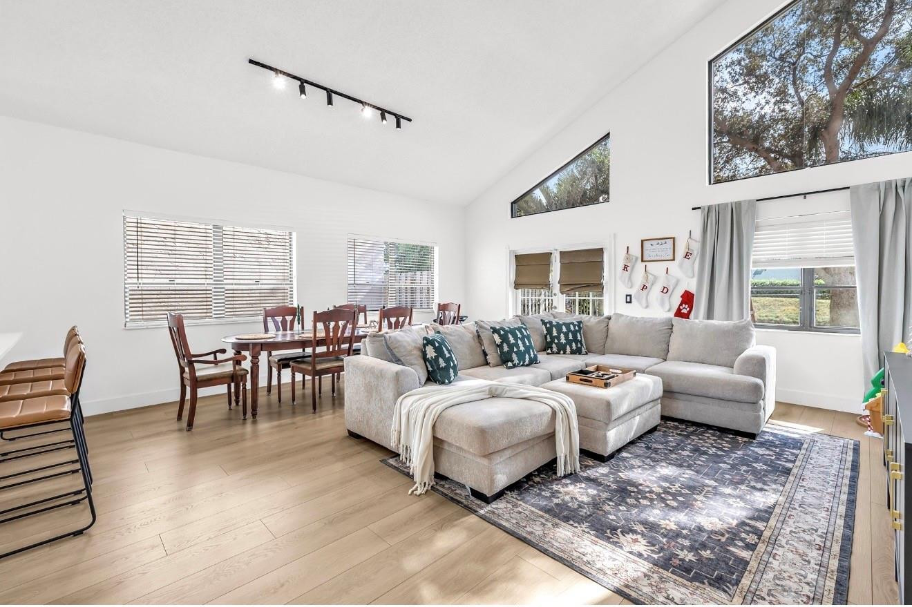 8610 Kimble Way Boca Raton, FL 33433 - Photo 4 of 26 a bedroom with furniture and a large window