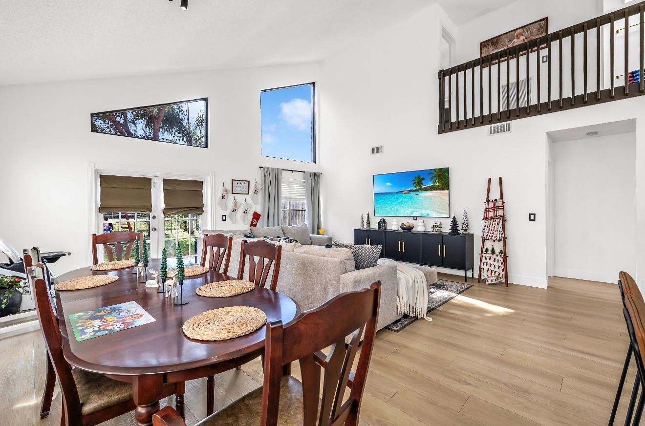 8610 Kimble Way Boca Raton, FL 33433 - Photo 5 of 26 a view of a dining room with furniture