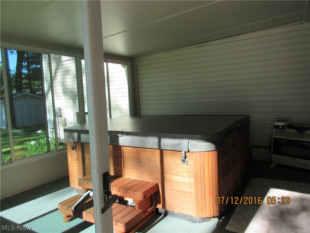 7645 Micawber Road Northeast Warren, OH 44484 - Photo 26 of 27 hot tub room looks out to deck