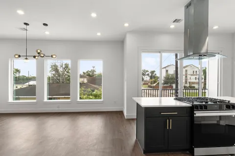 a bathroom with a large window and sink