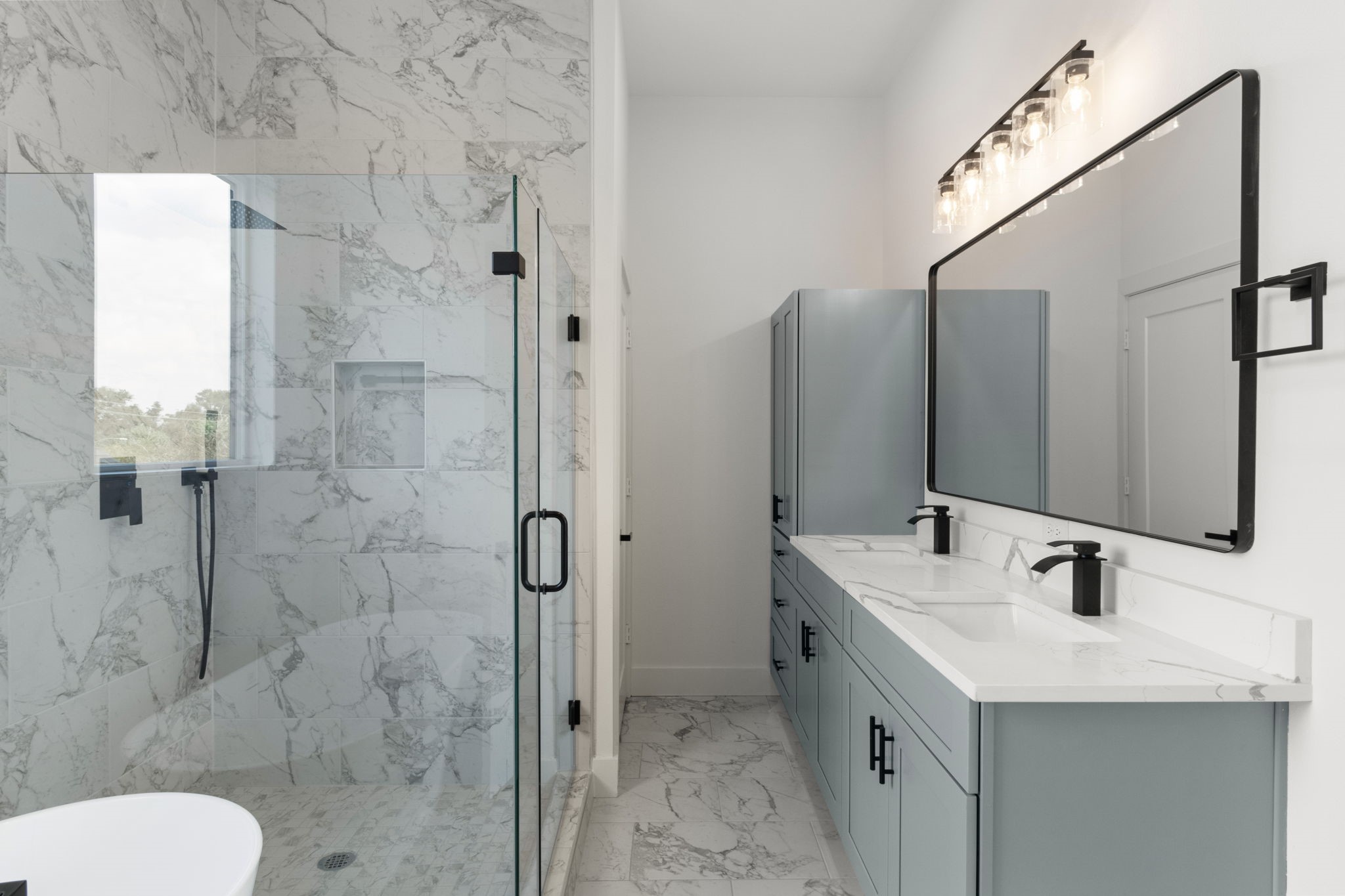 5512 Hardy Street Houston, TX 77009 - Photo 22 of 39 a bathroom with a sink toilet and shower