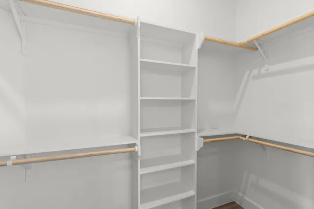 a view of an empty walk in closet