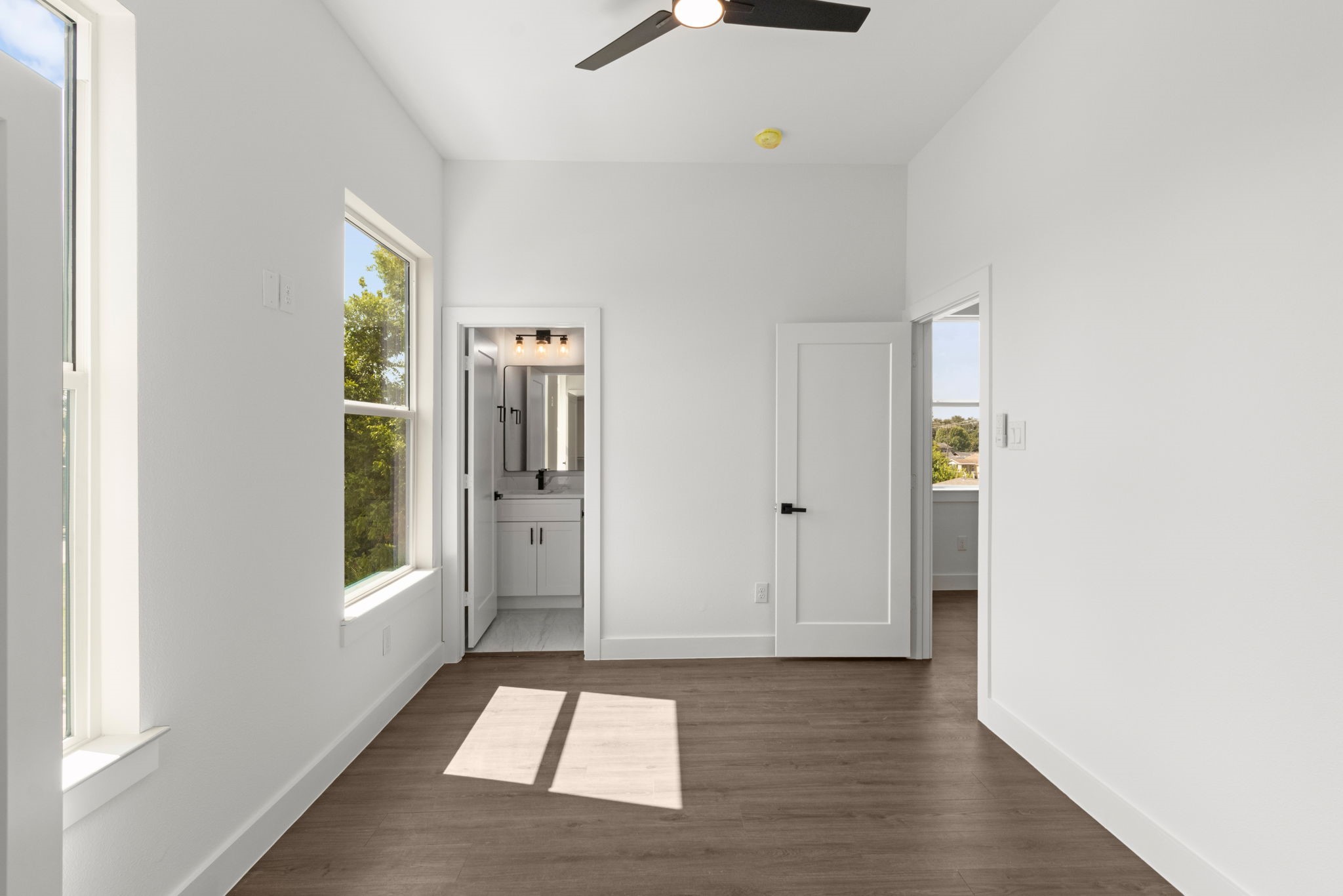 5512 Hardy Street Houston, TX 77009 - Photo 30 of 39 a view of an entryway with wooden floor and windows