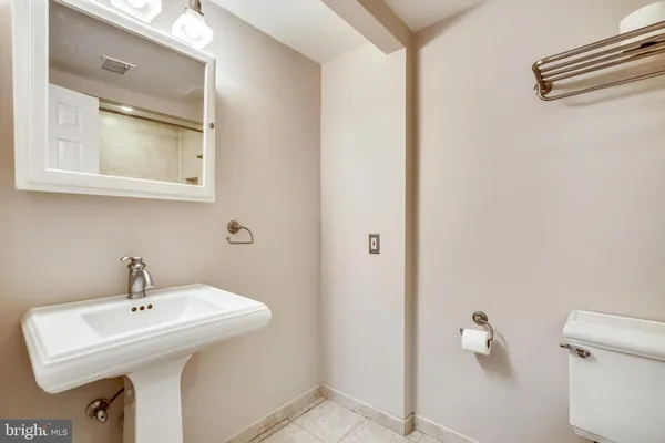 a bathroom with a sink and a toilet