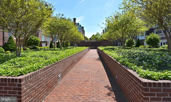 a view of a car park in front of house