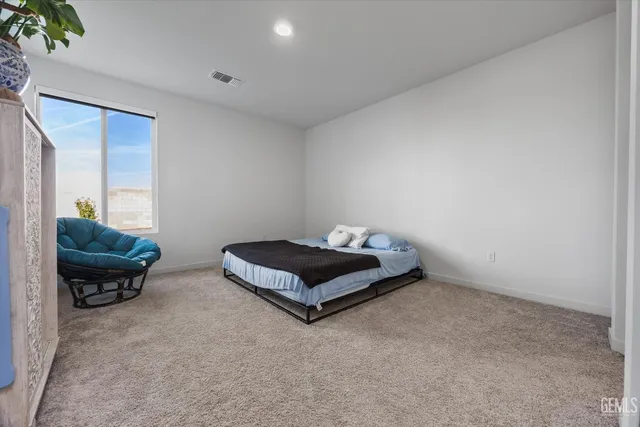 a room with furniture and a window