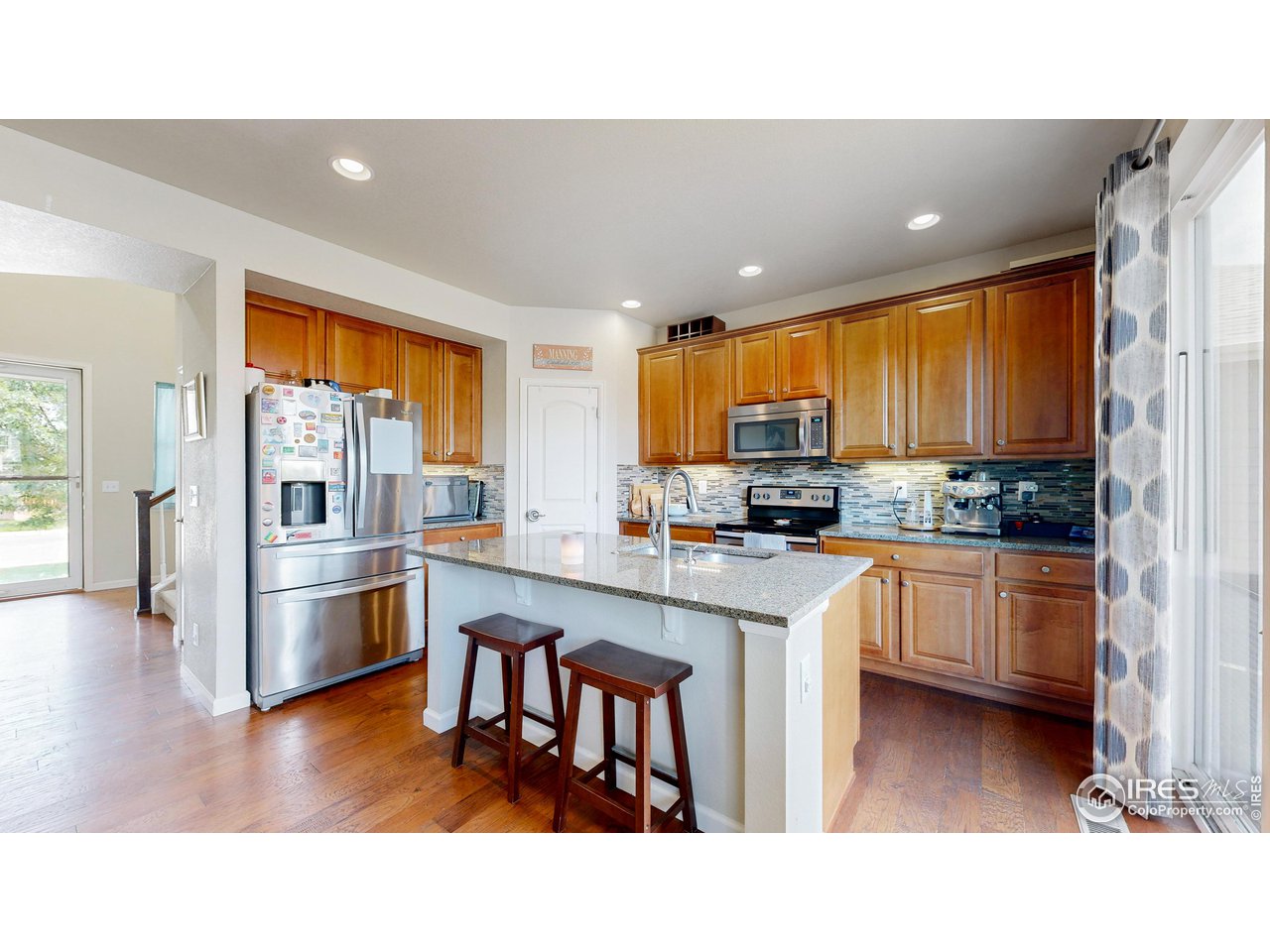 868 Ranchhand Drive Berthoud, CO 80513 - Photo 6 of 40 Kitchen island