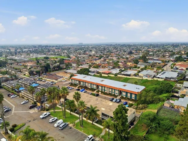 an aerial view of a city with lots of residential buildings