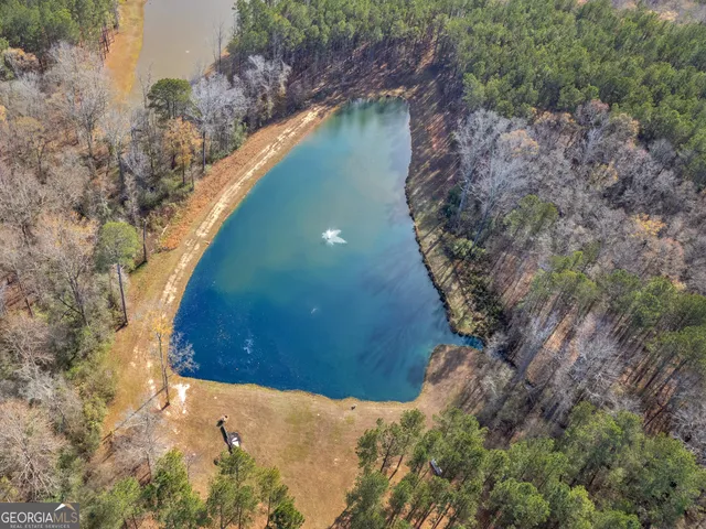 a kitchen with stainless steel appliances granite countertop a stove and cabinets