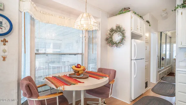 a living room with a flat screen tv and a fireplace