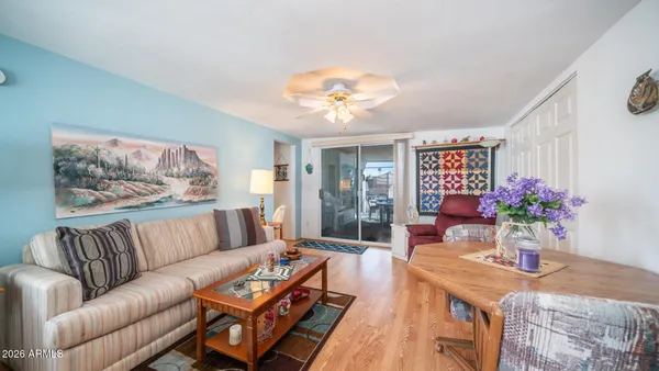 a bedroom with furniture and window