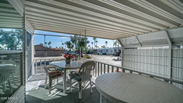 a living room with fireplace furniture and a flat screen tv
